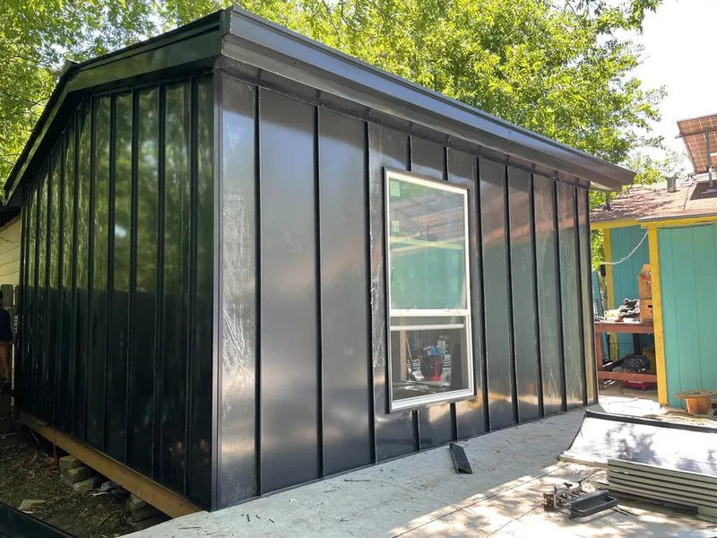 Black standing seam metal wall panels for Roof Inspection in West Donegal